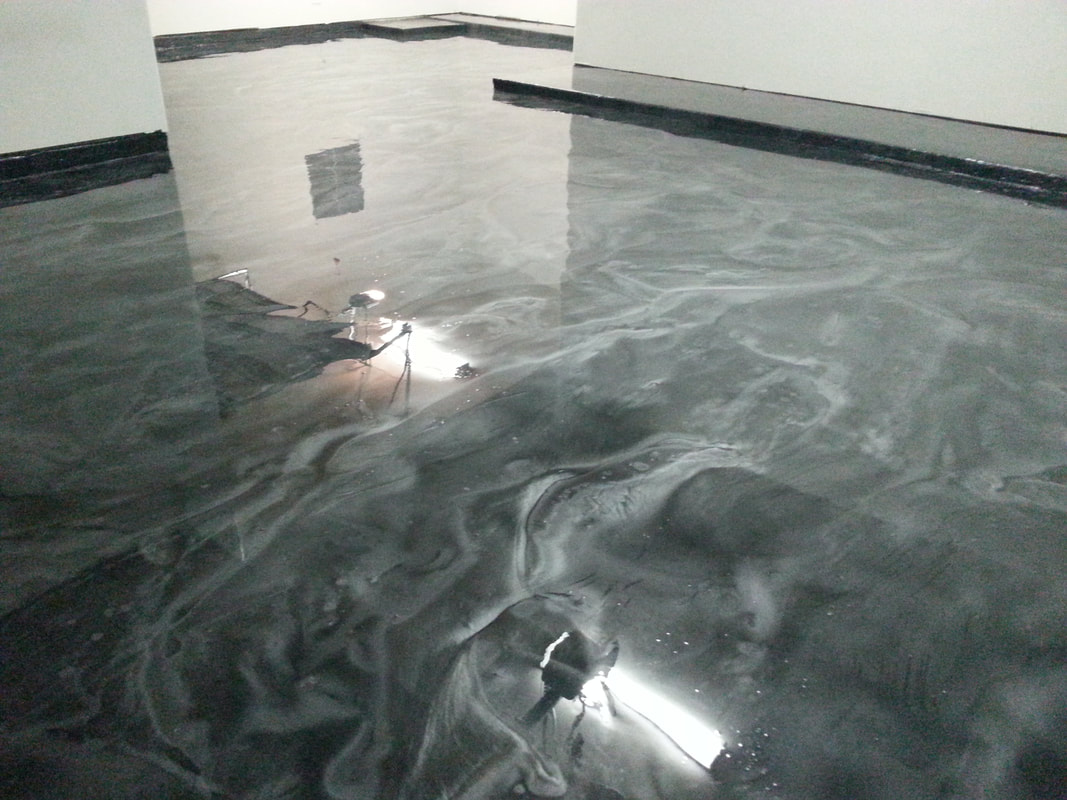 Grey epoxy flooring in garage